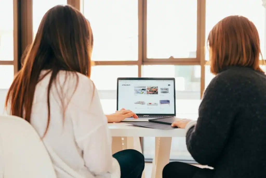 two women at laptop